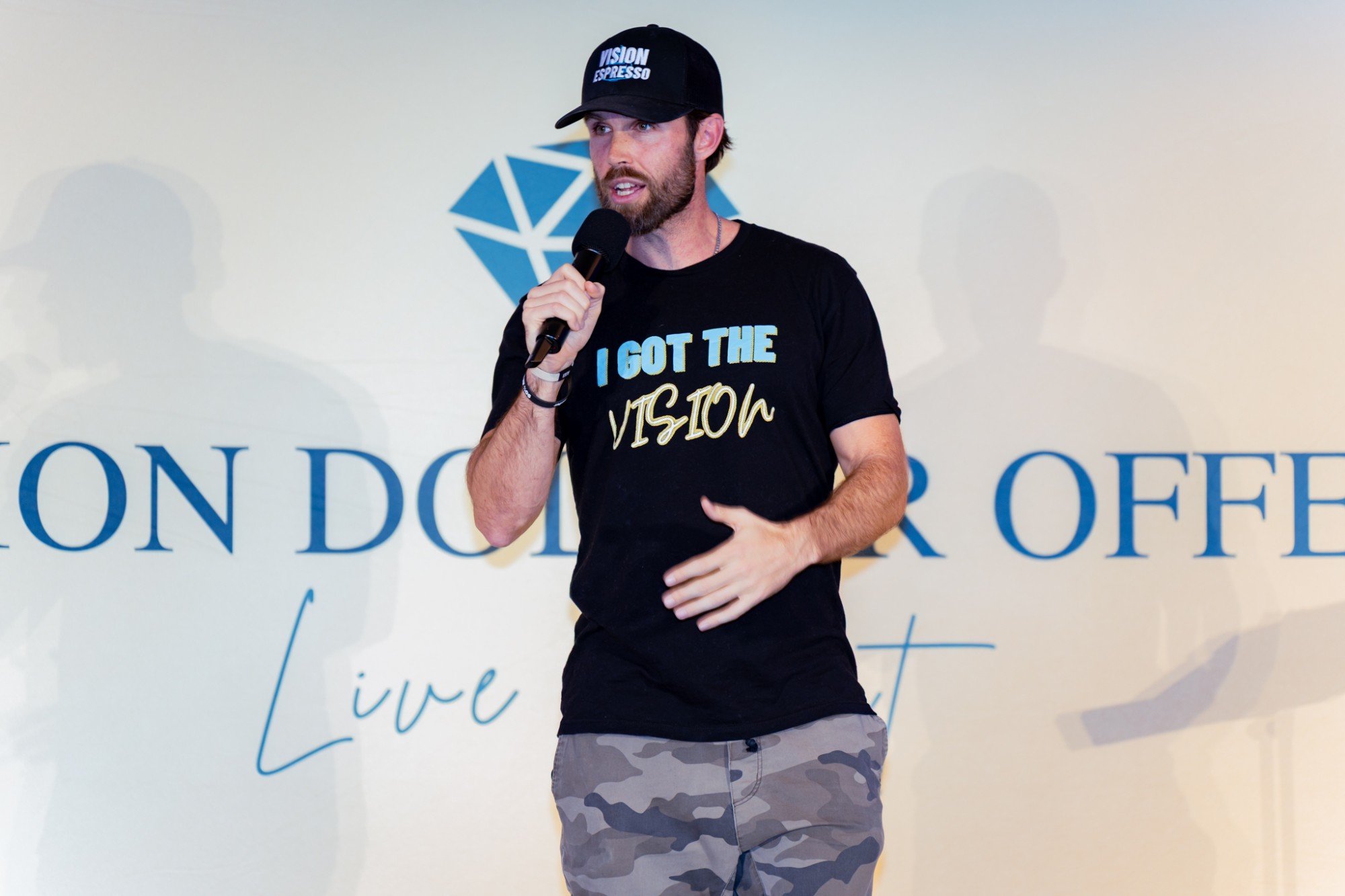 Niko speaking on stage
