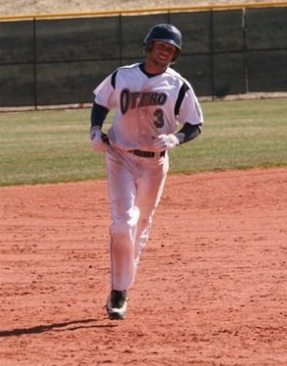 Niko Arapkiles rounding the bases after a walk-off home run